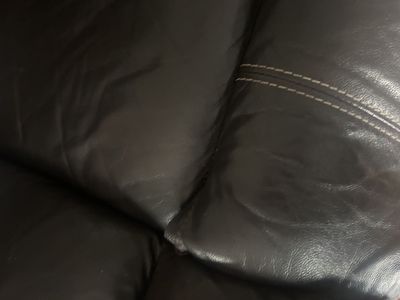 Brown Faux Leather Reclining Loveseat with Console & Cupholders, White Stitching