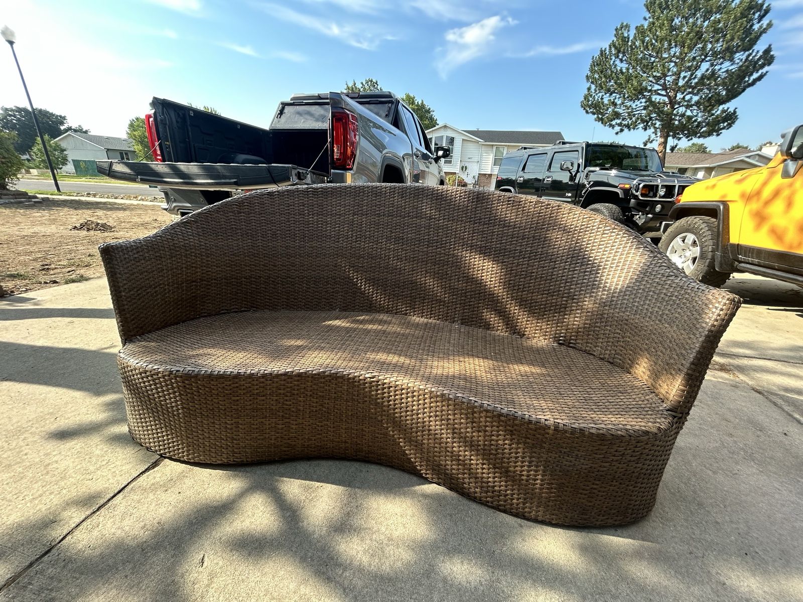 Curved Outdoor All-Weather Wicker Sofa Four Hands Portia couch patio set