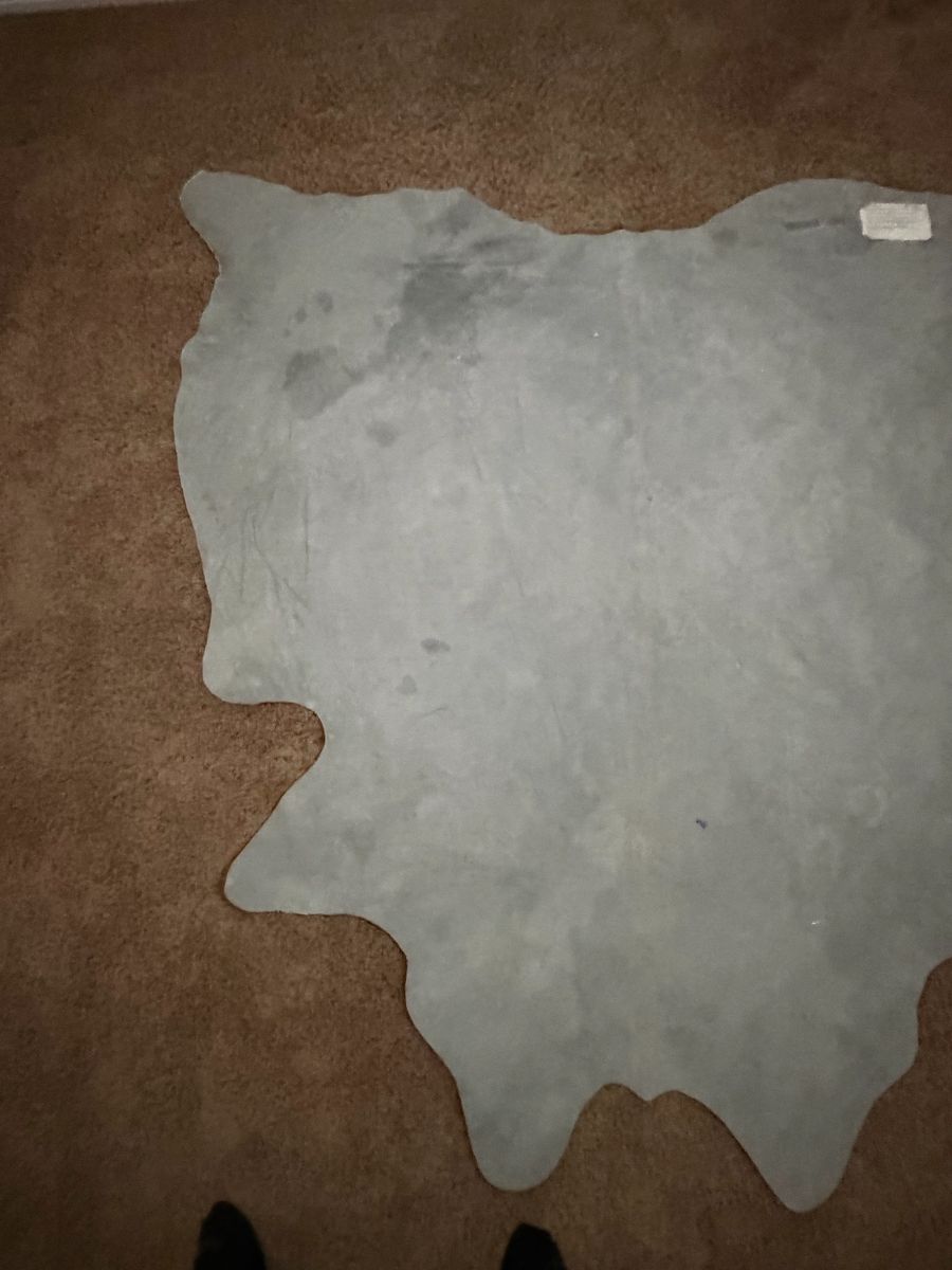 Large Gray Cow Hide. Rug/Leather, 90" x 70", Irregular Shape tried to make a chair out of it so it is just scrap pieces