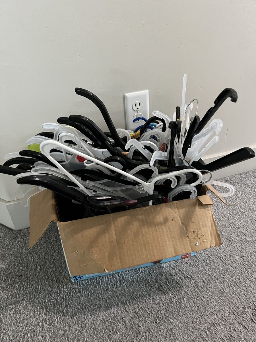 Box of Plastic hangers, closet organizers