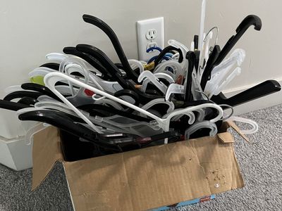 Box of Plastic hangers, closet organizers