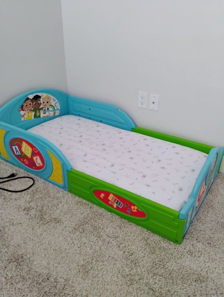 Delta Children CoComelon Toddler Bed - Plastic Frame, Ages 15m+ - with Mattress