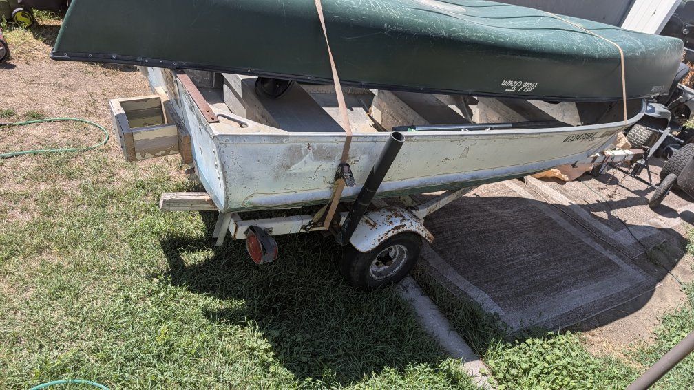 Aluminum fishing Jon Boat (12ft) with Boat Trailer and Old Town Canoe, 4hp motor
