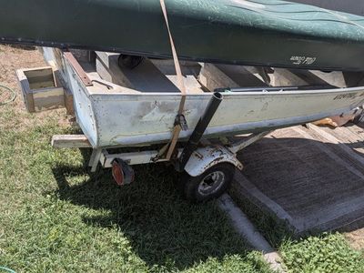 Aluminum fishing Jon Boat (12ft) with Boat Trailer and Old Town Canoe, 4hp motor