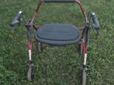 Red Four-Wheel Rolling Walker Rollator with Padded Seat and Hand Brakes