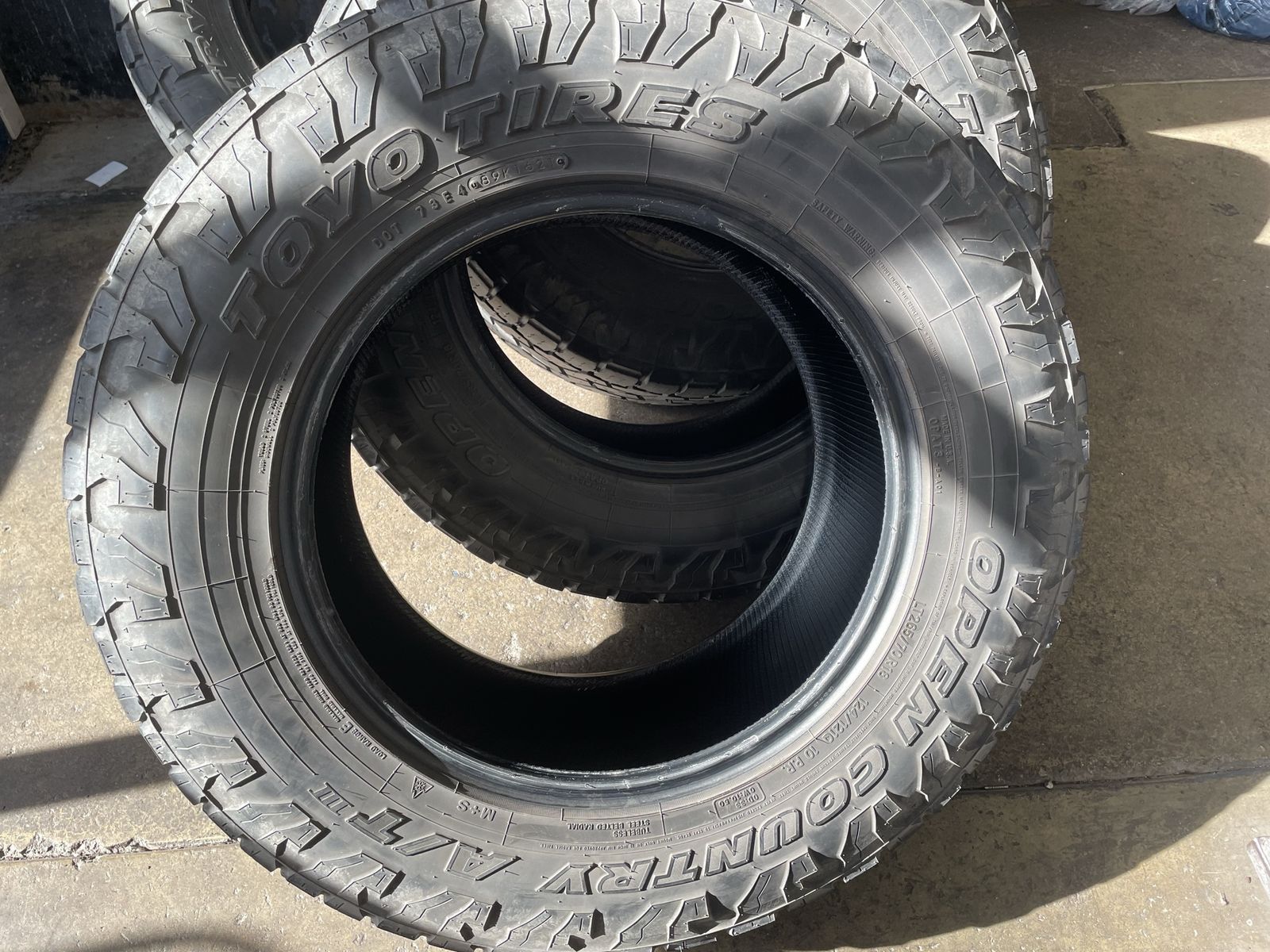 Open Country LT AT3 All terrain truck tires.