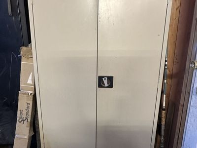 Metal cabinet with casters