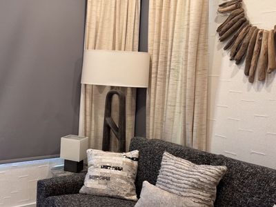 Black and White Textured Fabric Love Seat with Two Cushions. American Leather tweed pull out queen bed.