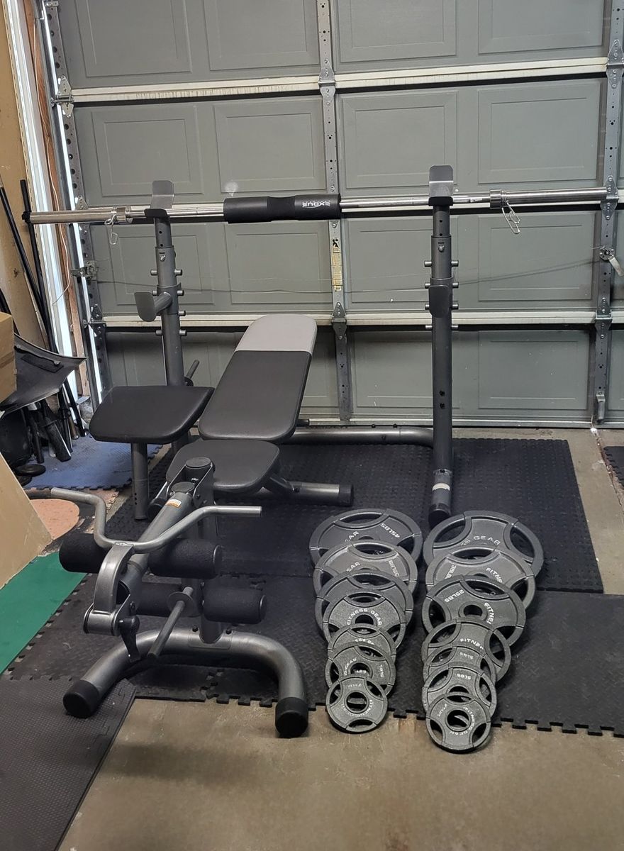 Bench and 255 pounds of weights