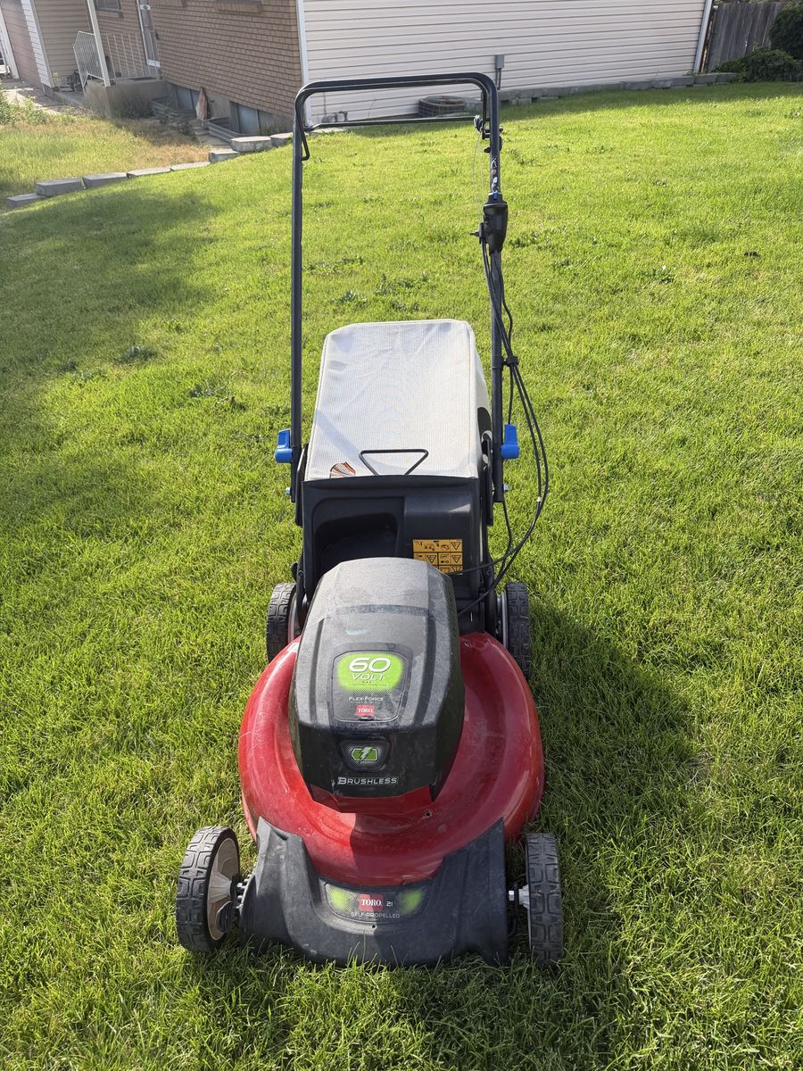 Toro 60V Max PowerJet Cordless Electric Self-Propelled Lawn Mower.