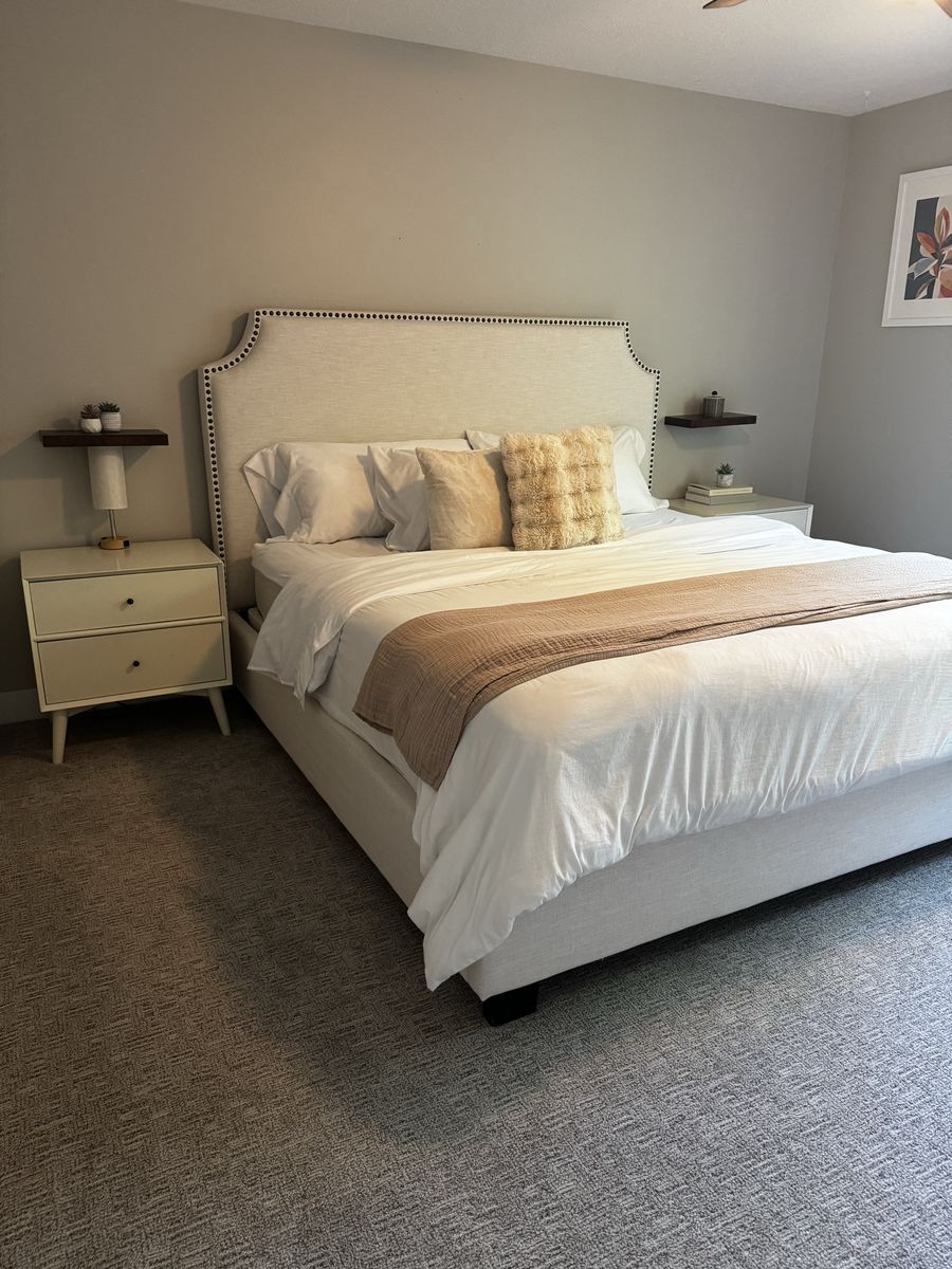King size upholstered bed with nightstands