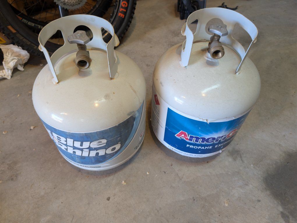 Two twenty pound propane tanks
