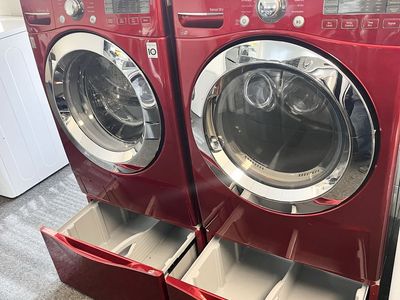 LG washer and dryer set with pedestals