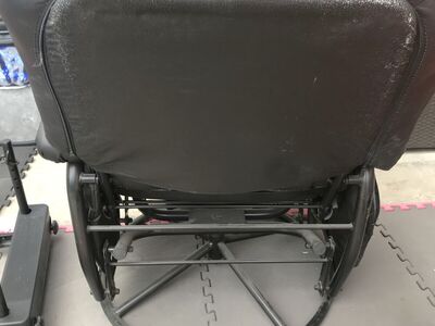 reclining Rocking patio chair with side pocket and ottoman (not shown)