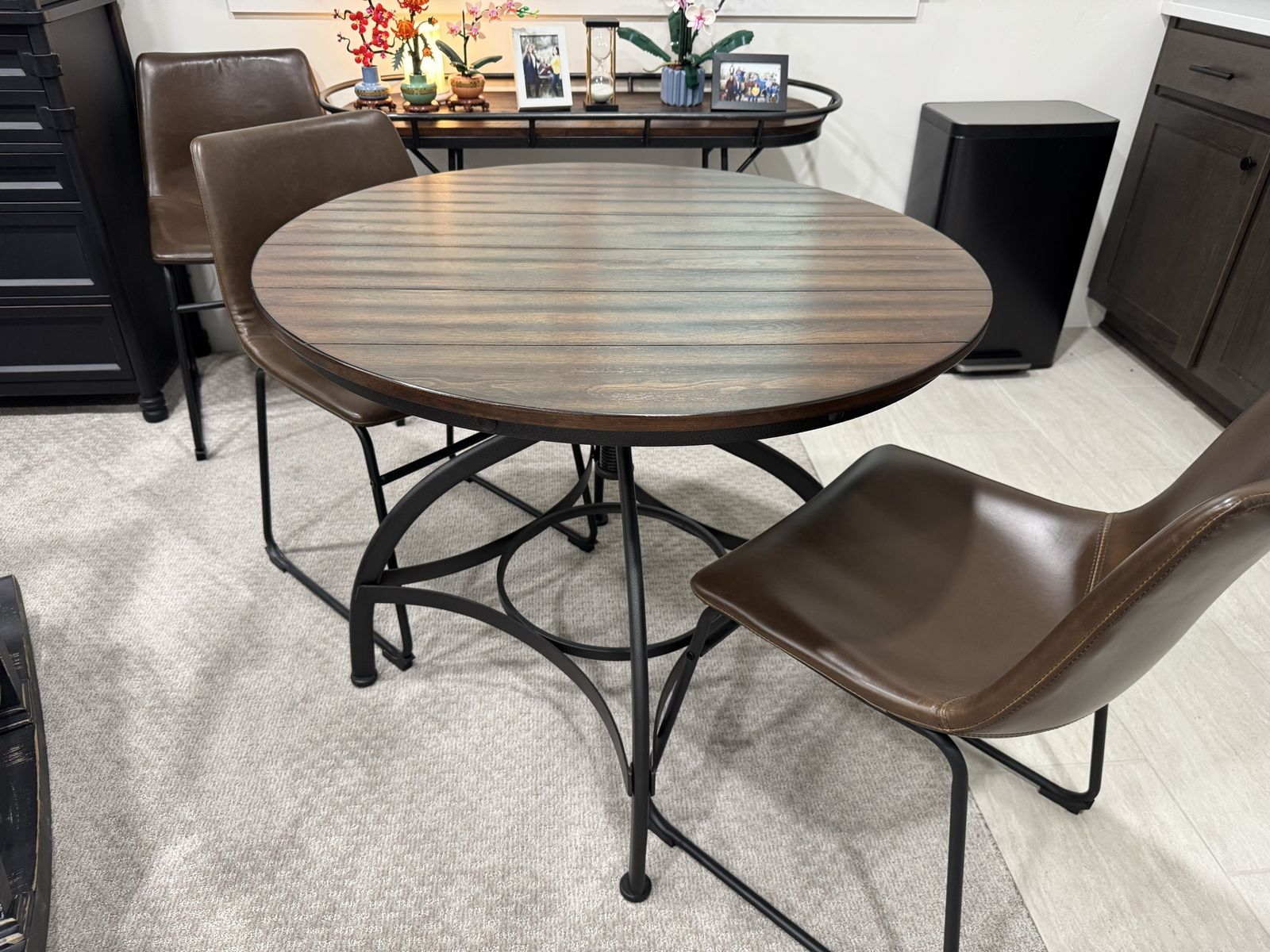 Round Industrial Wooden Top Dining Table Adjustable Height with Metal Base and 4 Leather Chairs