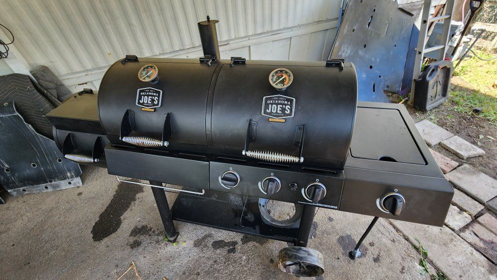 Oklahoma Joe's gas charcoal grill combo with smoker (**USED ONE TIME**) With cover.