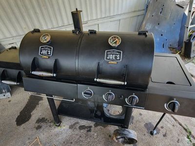 Oklahoma Joe's gas charcoal grill combo with smoker (**USED ONE TIME**) With cover.