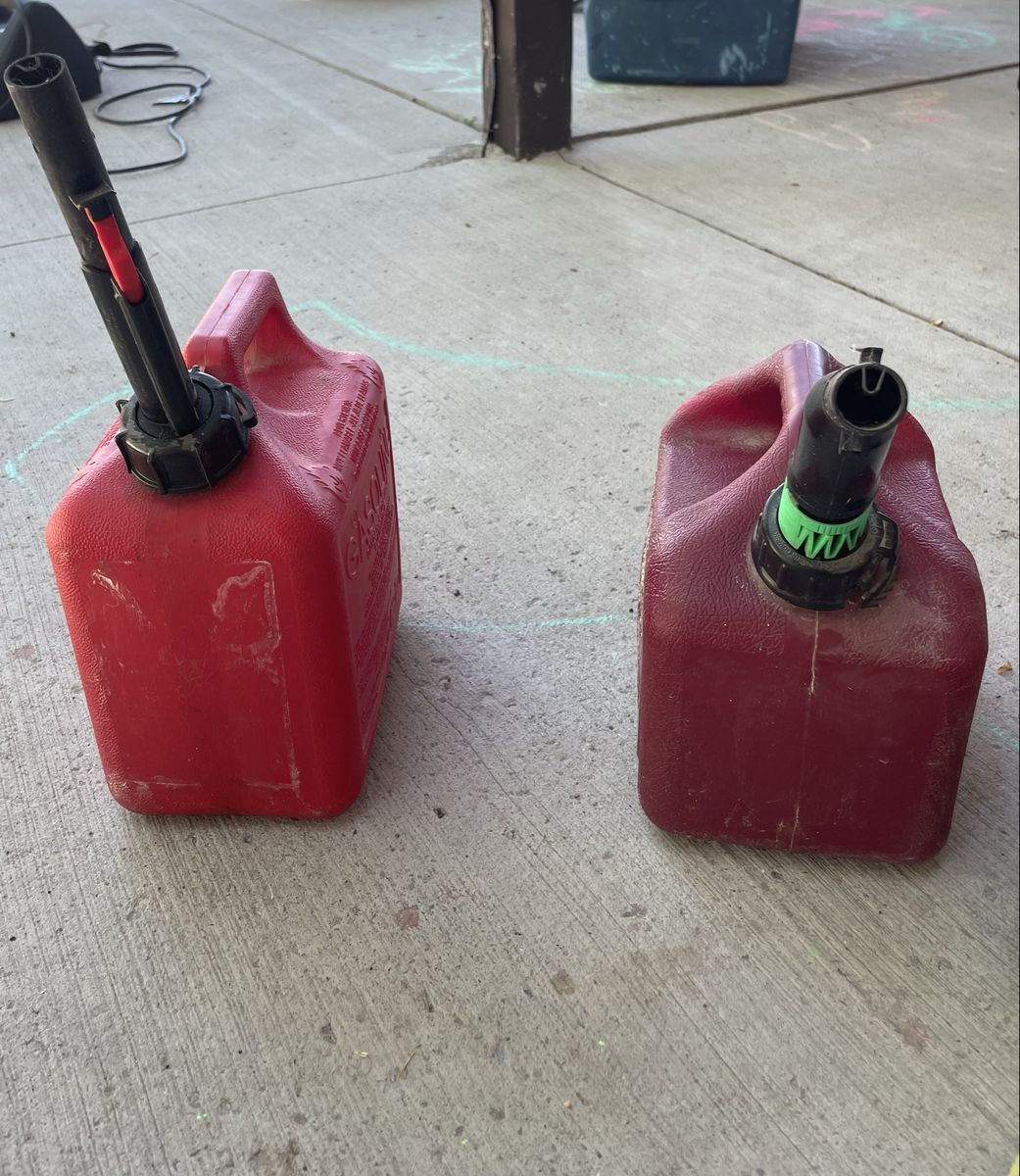Pair of Red Plastic Gasoline Cans - Used Fuel Storage Small