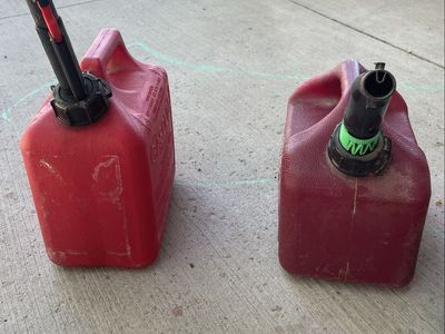Pair of Red Plastic Gasoline Cans - Used Fuel Storage Small