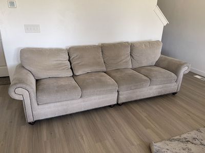Spacious Beige Fabric Sofa with Nailhead Trim - 4-Seater Couch for Living Room