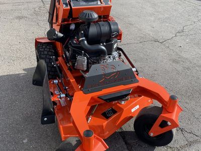 BAD BOY REVOLT STAND ON 36 W/KAWASAKI MOWER