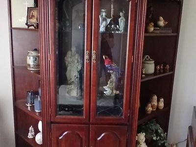 Curio cabinet with side shelves