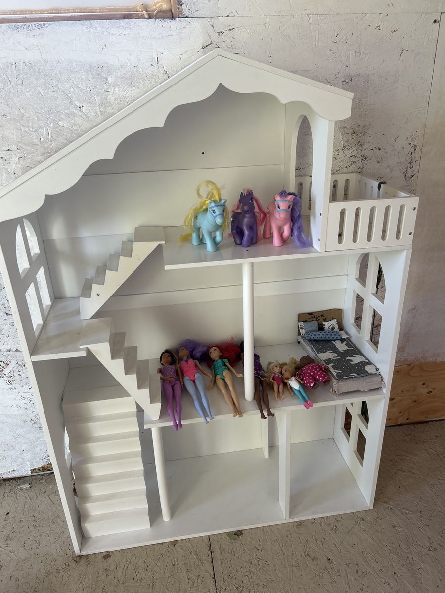 Sturdy wooden doll house