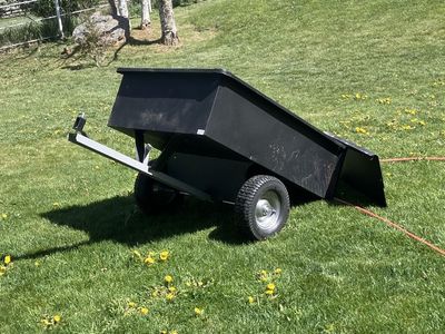 Pull behind yard dump trailer.