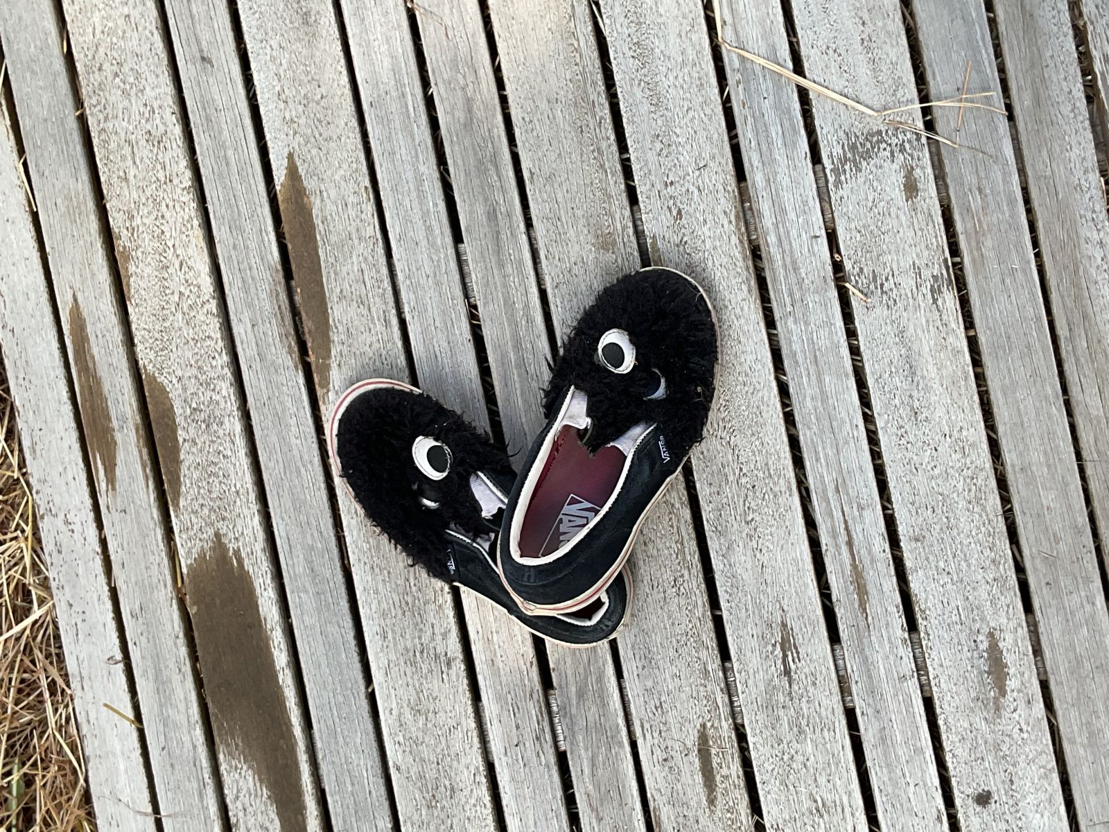 black fuzz with two eyes slip-in lowtops