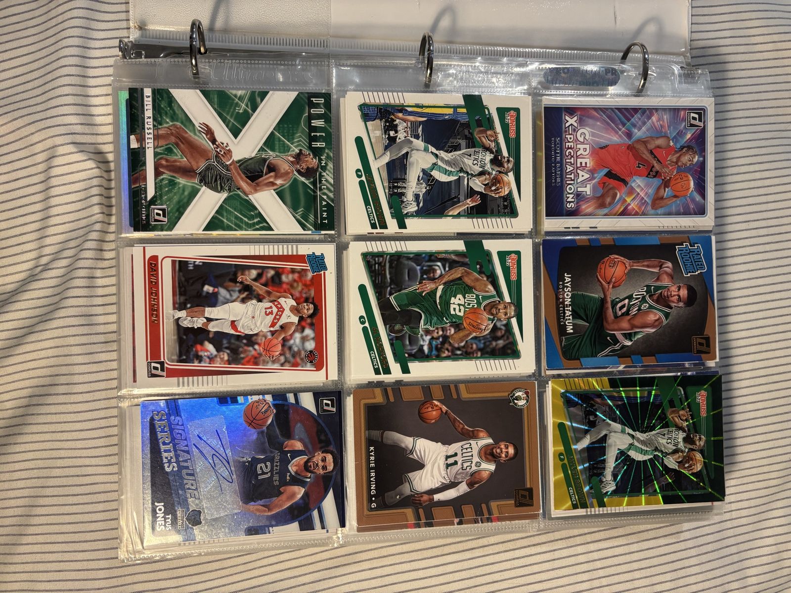 100+ Sports Cards (w/ Binder and sleeves)