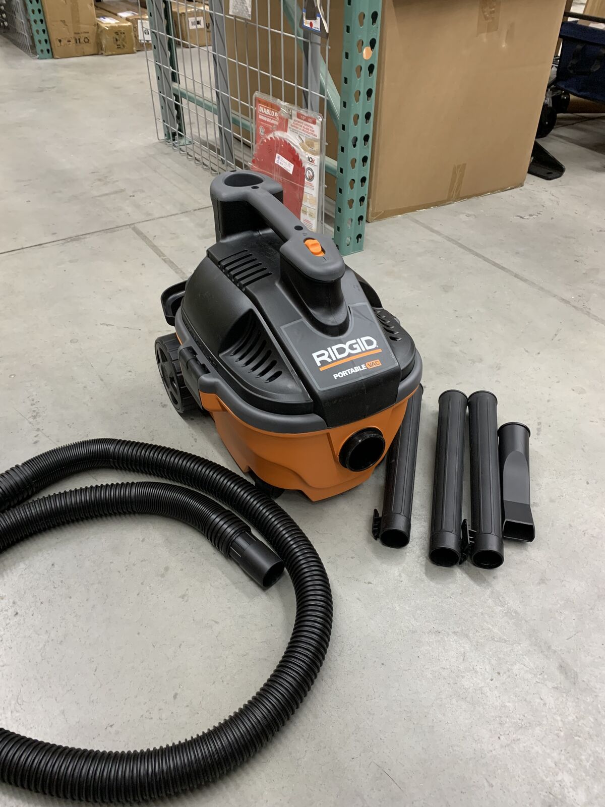 4 Gal. 5.0 Peak HP Portable Shop Vacuum Wet Dry Vac with Fine Dust Filter, Locking Hose and Attachments WD4070