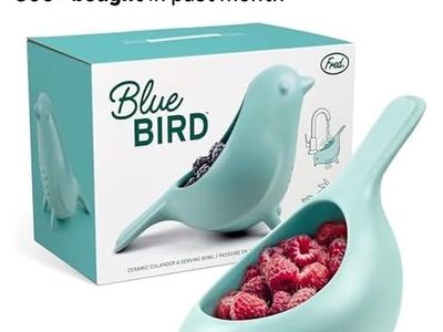 Genuine Fred Blue Bird ceramic colander and serving bowl in a light blue gray color