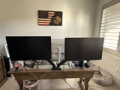 Two 27” LG HD Monitors with adjustable arms