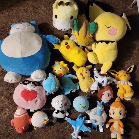Assorted Plush Toys Lot Featuring Pokemon Snorlax Pichu Jolteon Maggie Simpson
