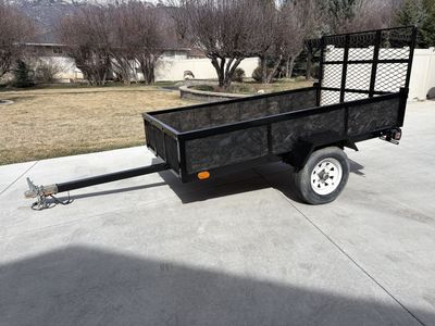 4'x8' utility trailer with ramp. Great condition.