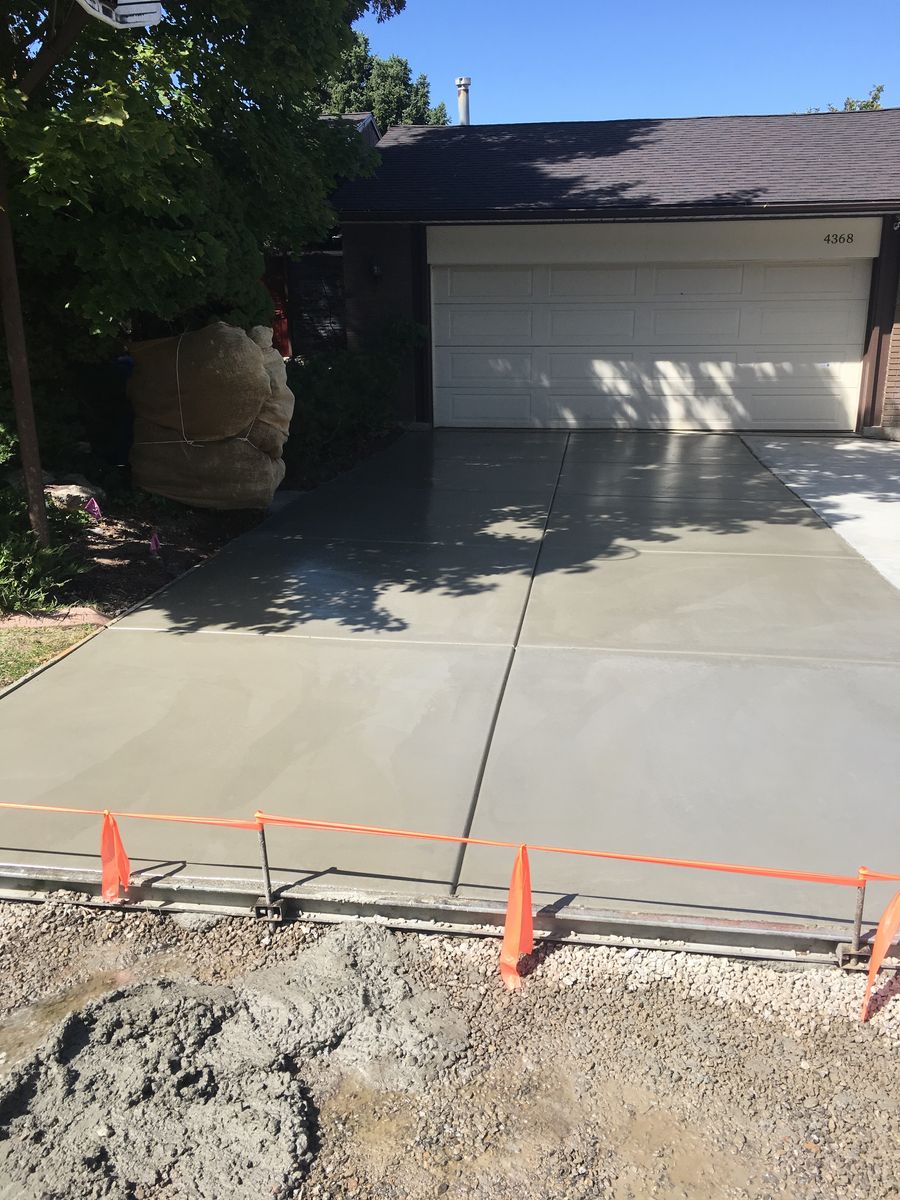 Stock Construction | Shed Pads | Concrete Design | Driveway Extensions | Concrete Tear-Out | Retaining Walls