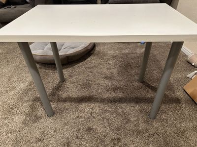 White Table with Metal Legs