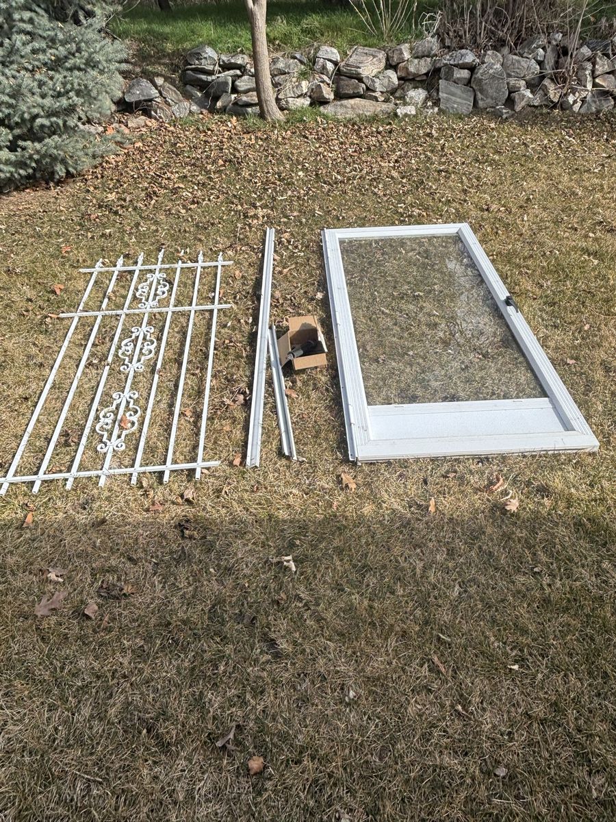 White Storm Door with Decorative Security Grille and Hardware