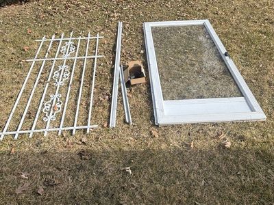 White Storm Door with Decorative Security Grille and Hardware