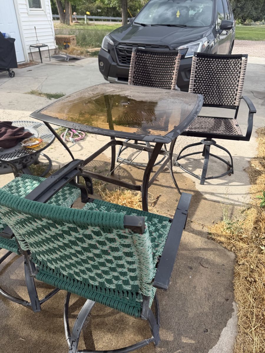 Patio Set with Glass Top Table and 6 Woven Swivel Chairs