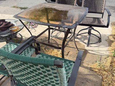 Patio Set with Glass Top Table and 6 Woven Swivel Chairs