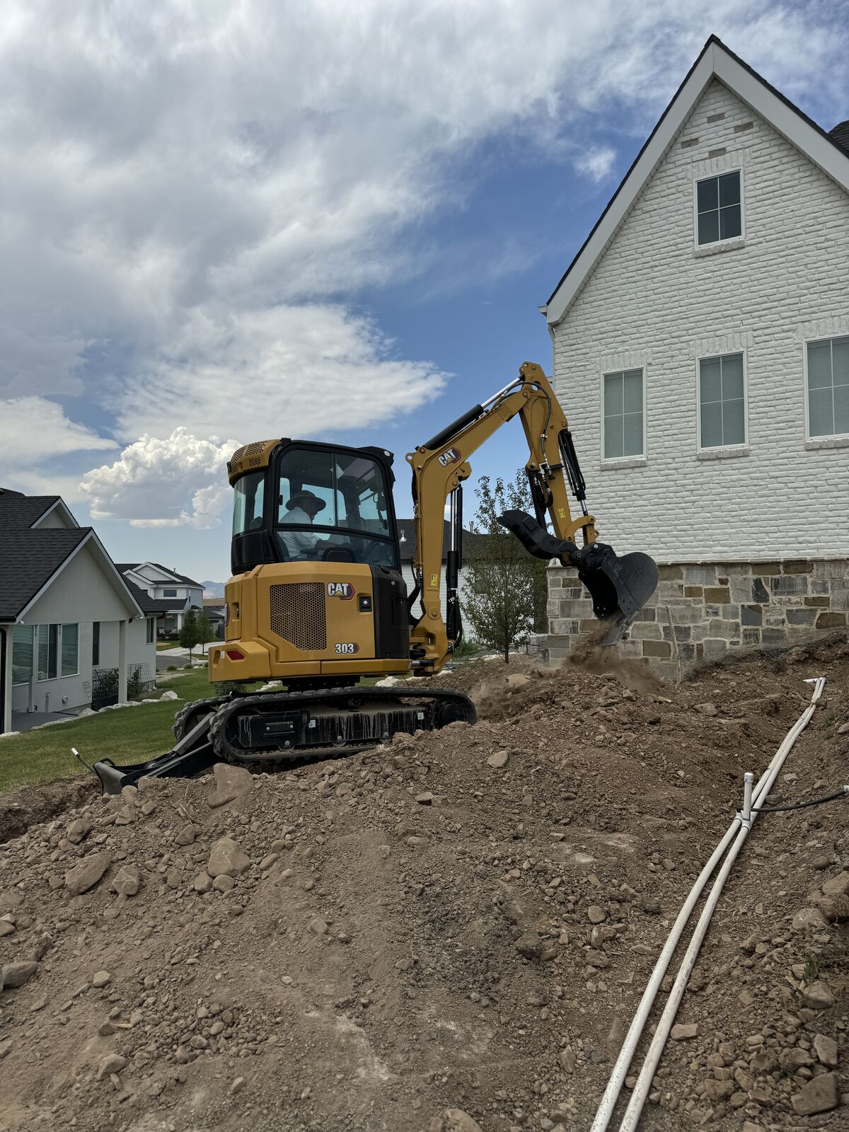 Cat 303 Excavator – 6,000 lbs Rental