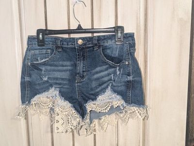 Almost Famous Women's Size 11 High Rise Distressed Denim Shorts with Crochet Lace Trim
