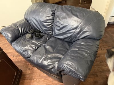Blue leather loveseat