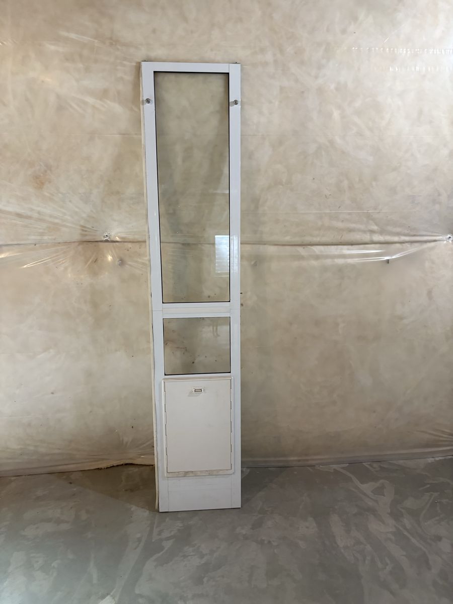 Dog door for sliding glass door