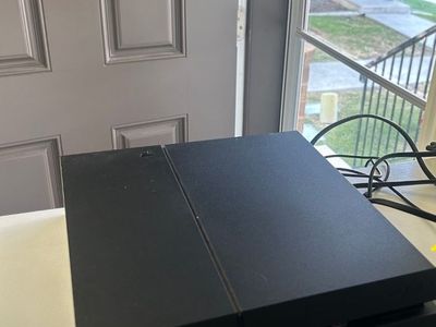 Original PlayStation 4 (500GB) in excellent working condition