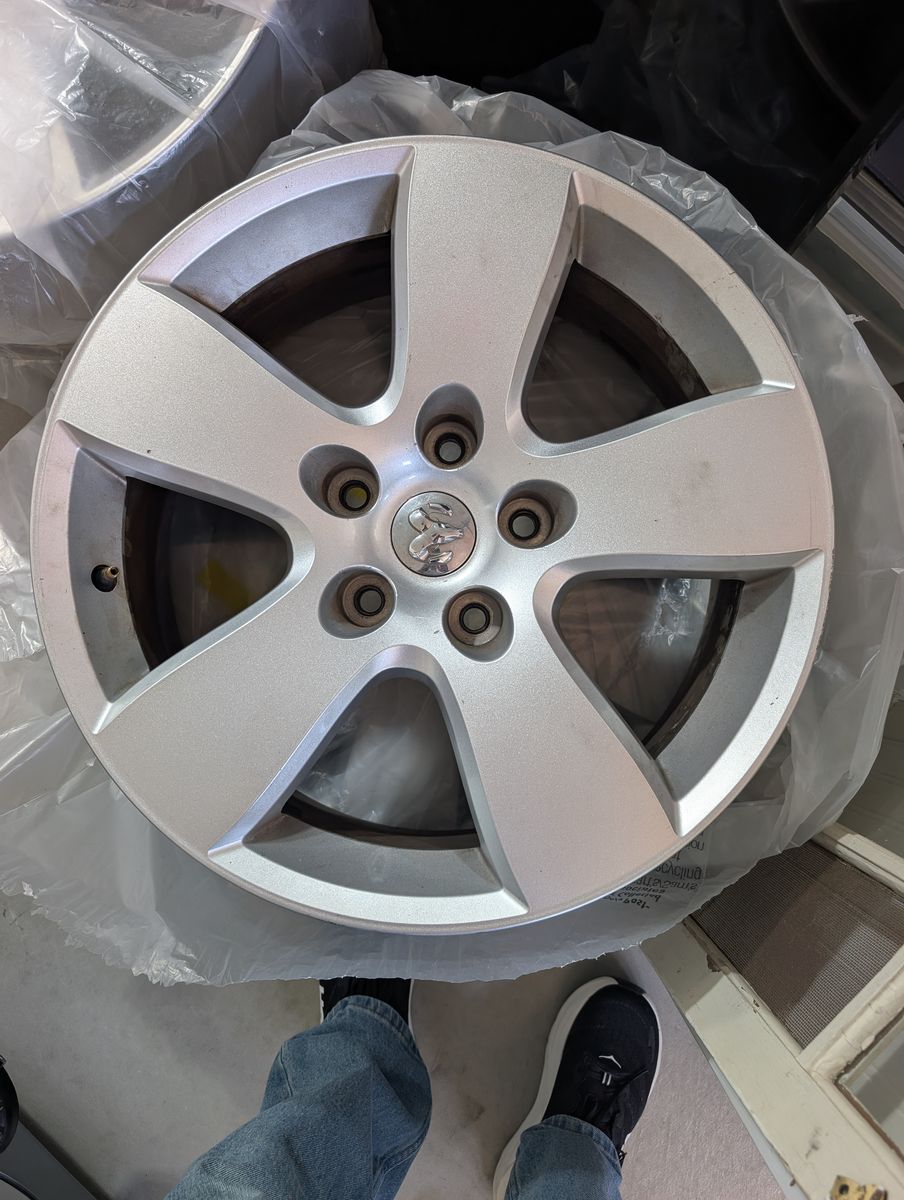 4th generation Dodge Ram stock wheels