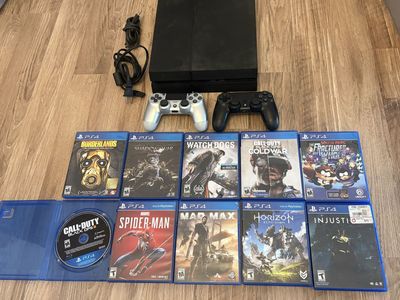 PS4 Original w/ 2 controllers and 10 games