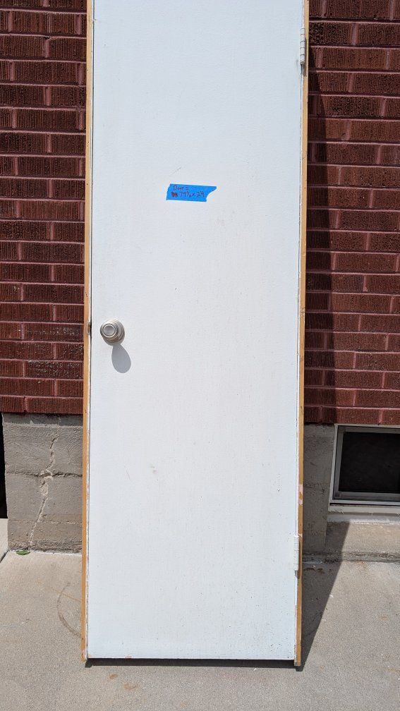 Used White Interior Door 79.5" x 24" with Doorknob and Hooks - Good Condition
