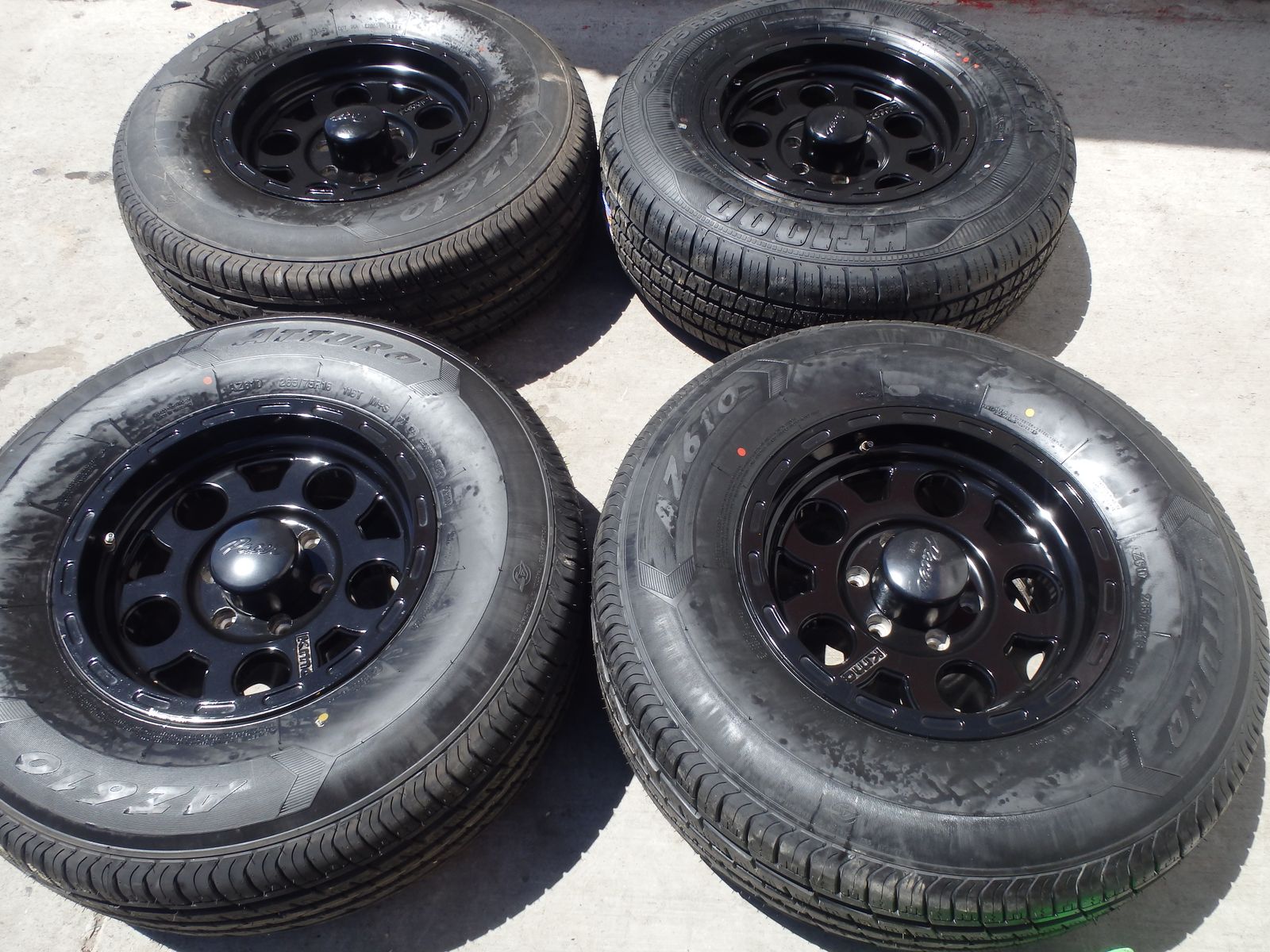 SET OF USED BLACK OFFROAD WHEELS 16" INCH AND TIRES 265/75R16